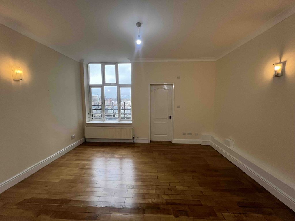 Property photo 3 of 8 Living Room