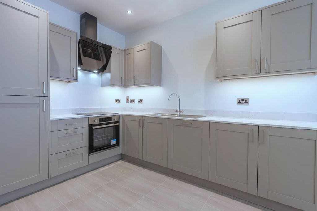 Property photo 2 of 9 Kitchen