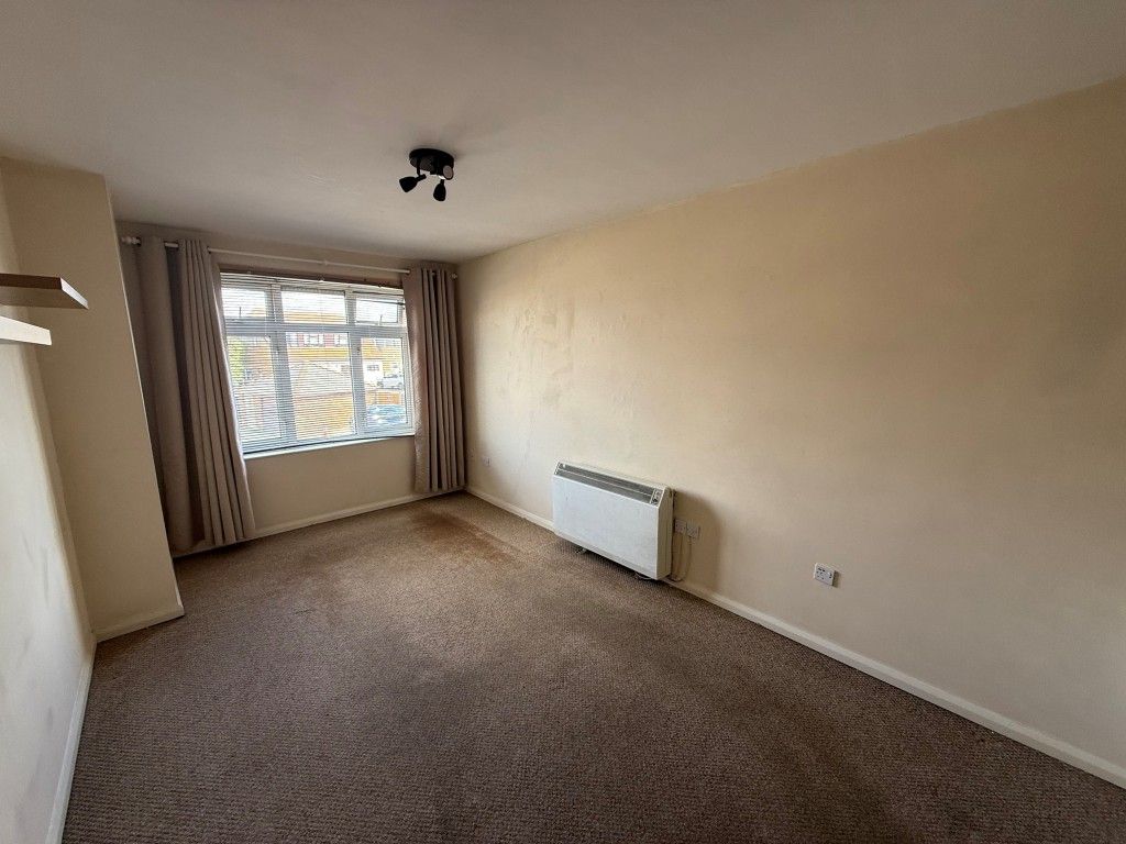 Property photo 2 of 7 Living Room Showing Window And Storage Heater