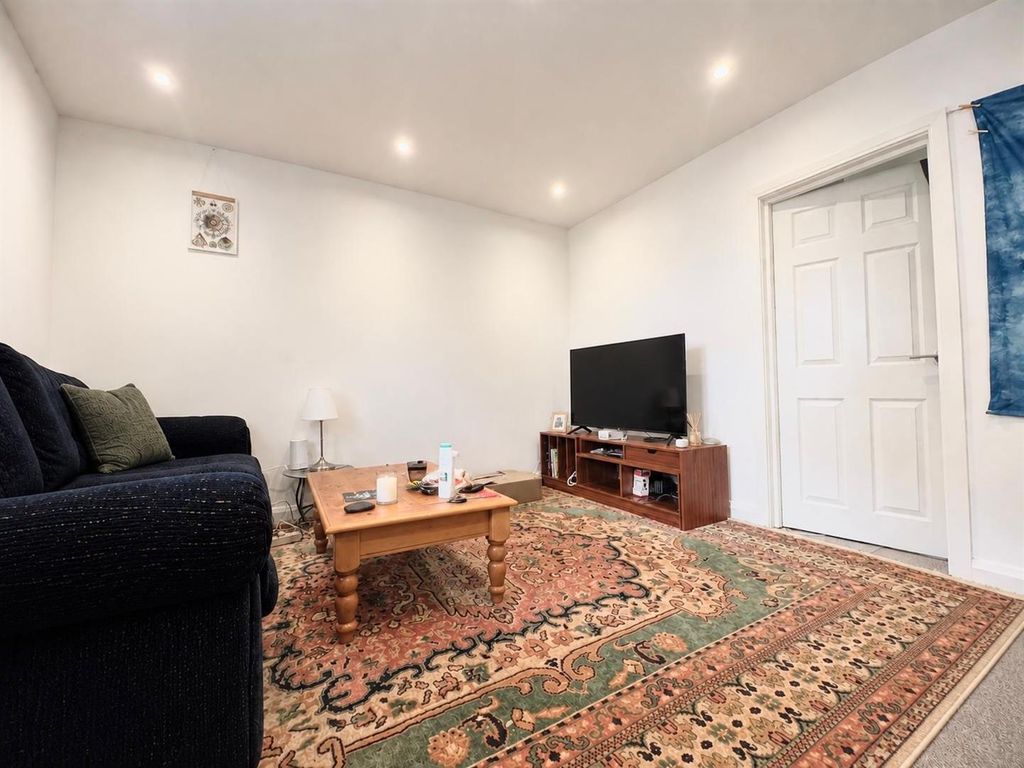 Property photo 3 of 8 Living Room