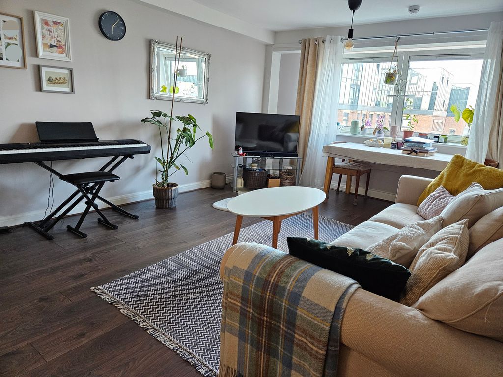 Property photo 1 of 6 Living Area