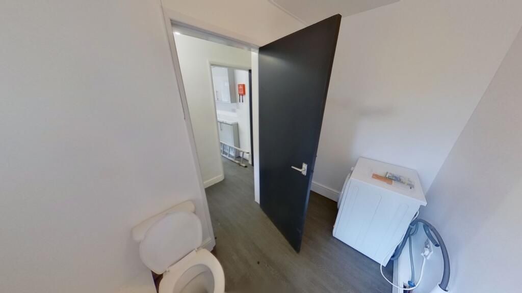 Property photo 1 of 11 A Clean And Simple Single Toilet Room With White W...