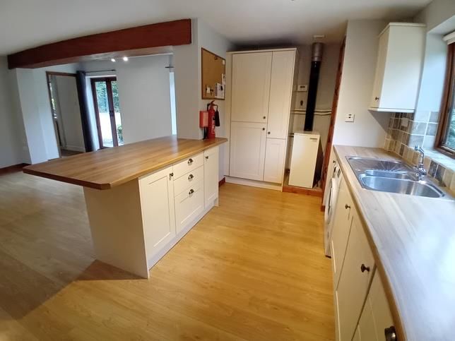 Property photo 3 of 12 Kitchen