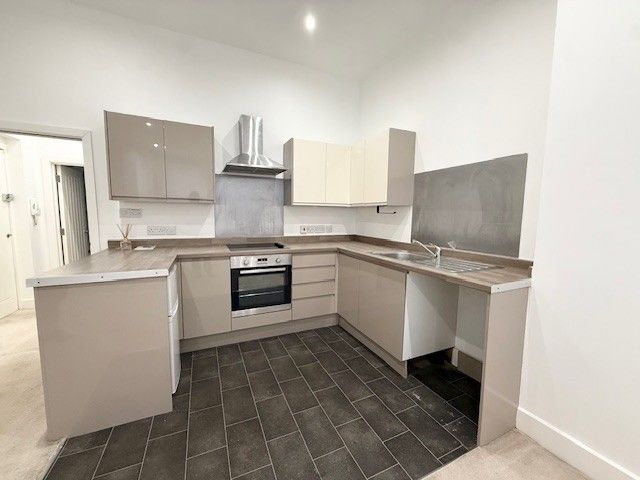 Property photo 2 of 8 Kitchen