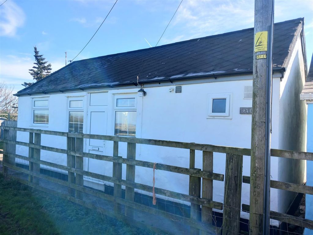 Property photo 3 of 12 Sea Cott Seaward Elev.Jpg
