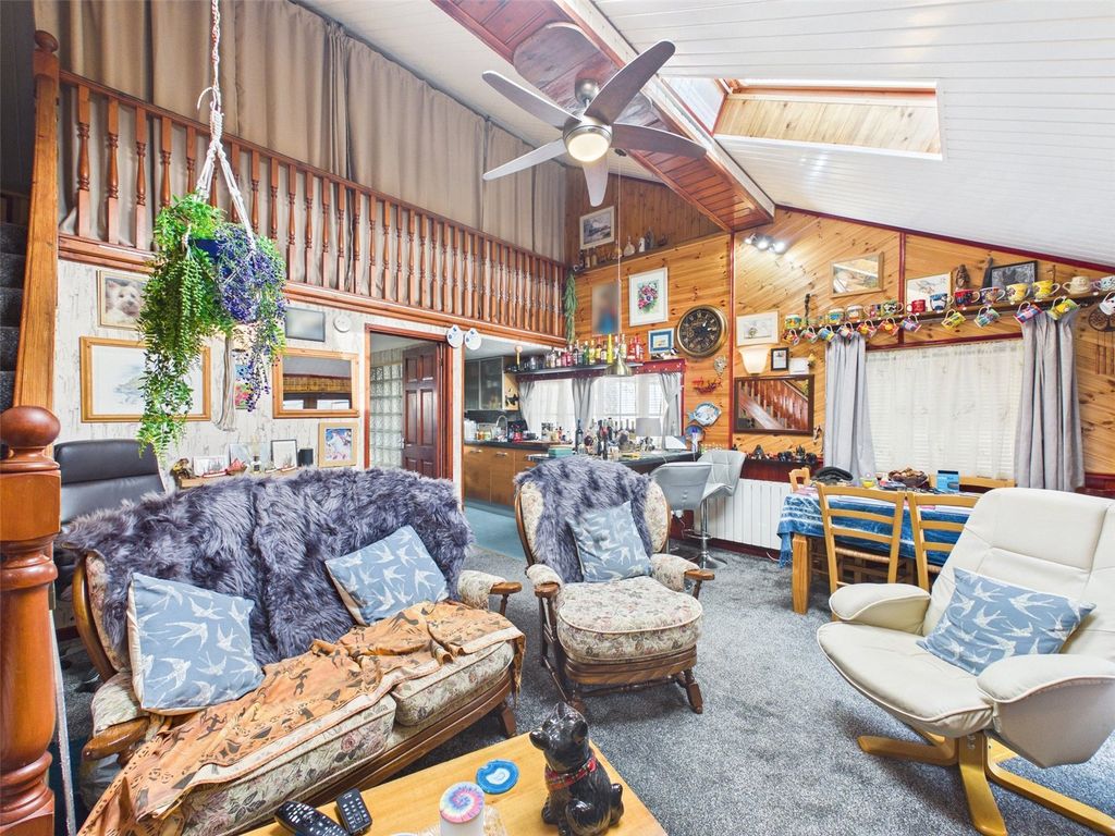 Property photo 2 of 9 Living