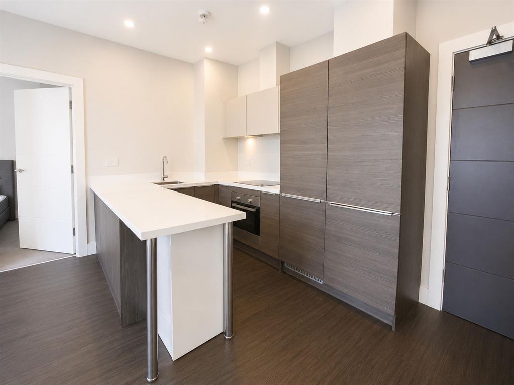 Property photo 2 of 7 Modern Kitchen With Sleek Breakfast Bar...