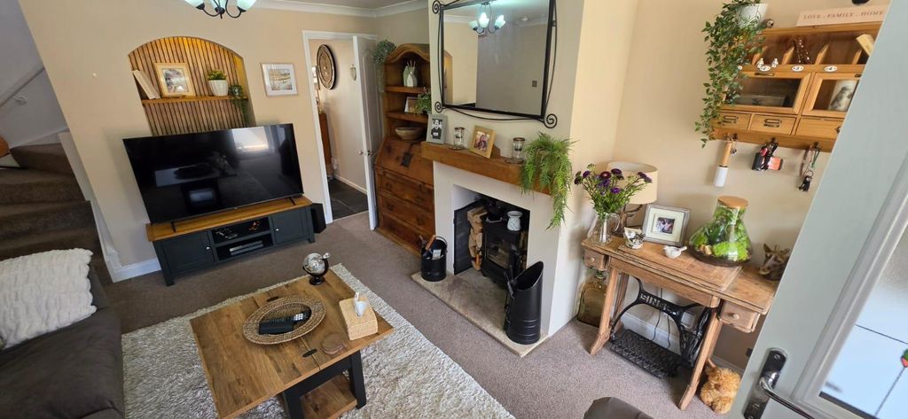 Property photo 3 of 13 Sitting Room With Log Burner