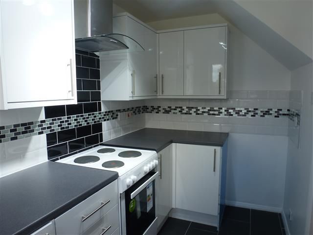 Property photo 3 of 8 Kitchen