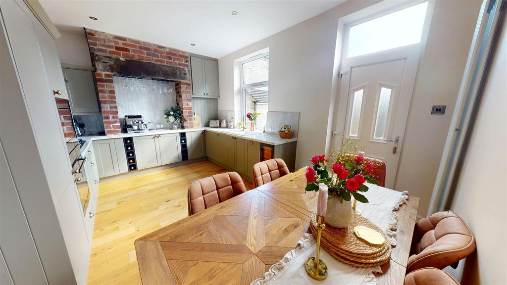 Property photo 2 of 13 Dining Kitchen