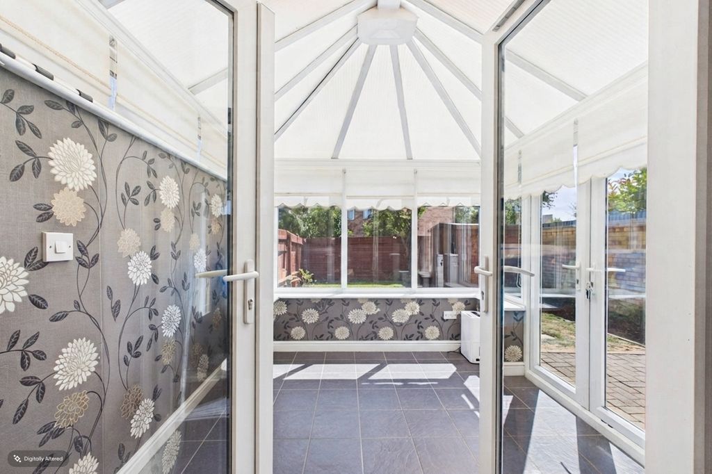 Property photo 3 of 30 The Conservatory With Doors To The Sunny South Fac