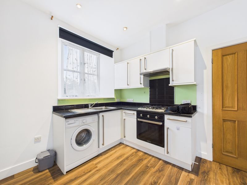 Property photo 3 of 8 Kitchen Area