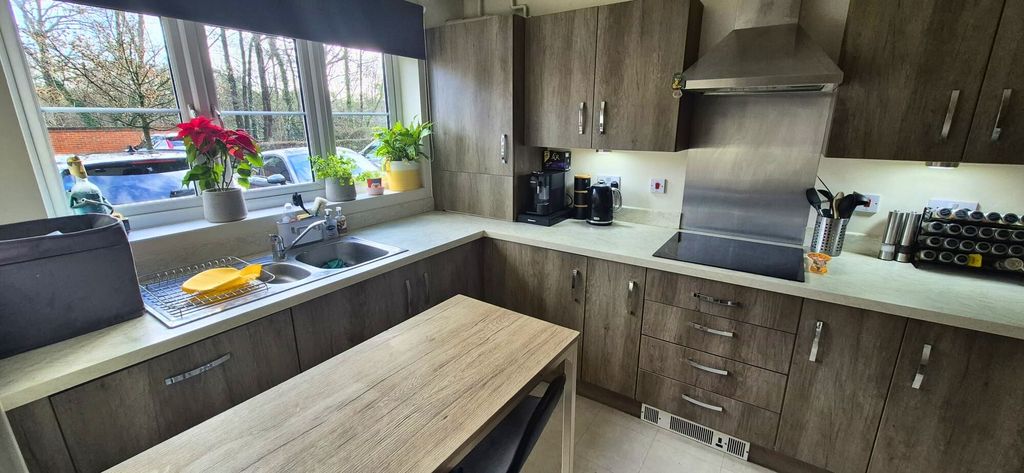 Property photo 2 of 12 Kitchen