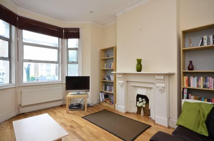 Property photo 1 of 8 A Two Bedroom Period Conversion Garden Flat Located Within A Short Walk From Clapham North Tube Station Offering Easy Access Into Central London.