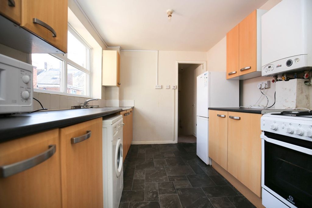 Property photo 3 of 7 A Spacious Kitchen With Good Natural Light And Mod...