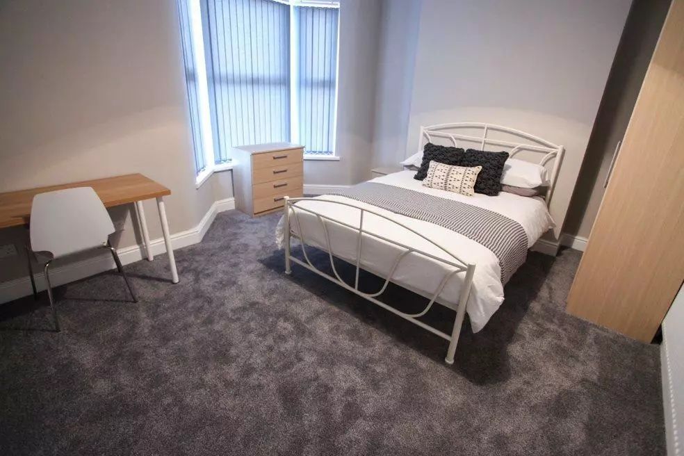 Property photo 1 of 8 Bright And Spacious Master Bedroom Featuring A Com...