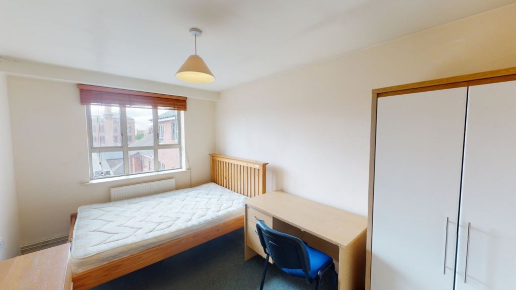 Property photo 2 of 6 Bright And Tidy Double Bedroom Featuring A Wooden ...
