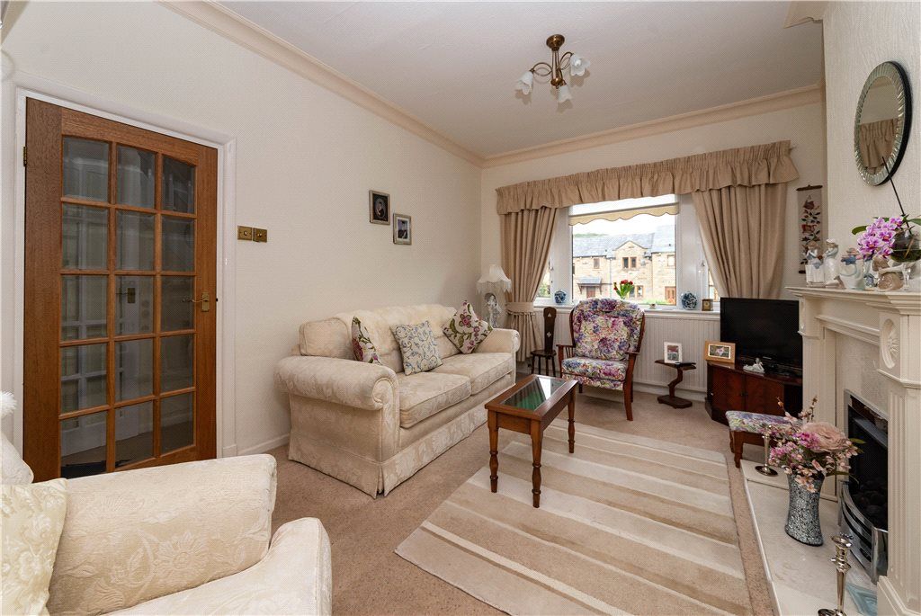 Property photo 2 of 11 Living Area