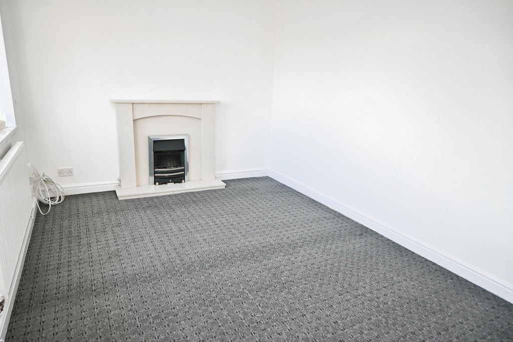 Property photo 3 of 16 Living Room