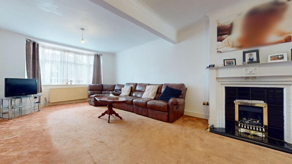 Property photo 1 of 15 A Spacious And Inviting Living Room Featuring A La...