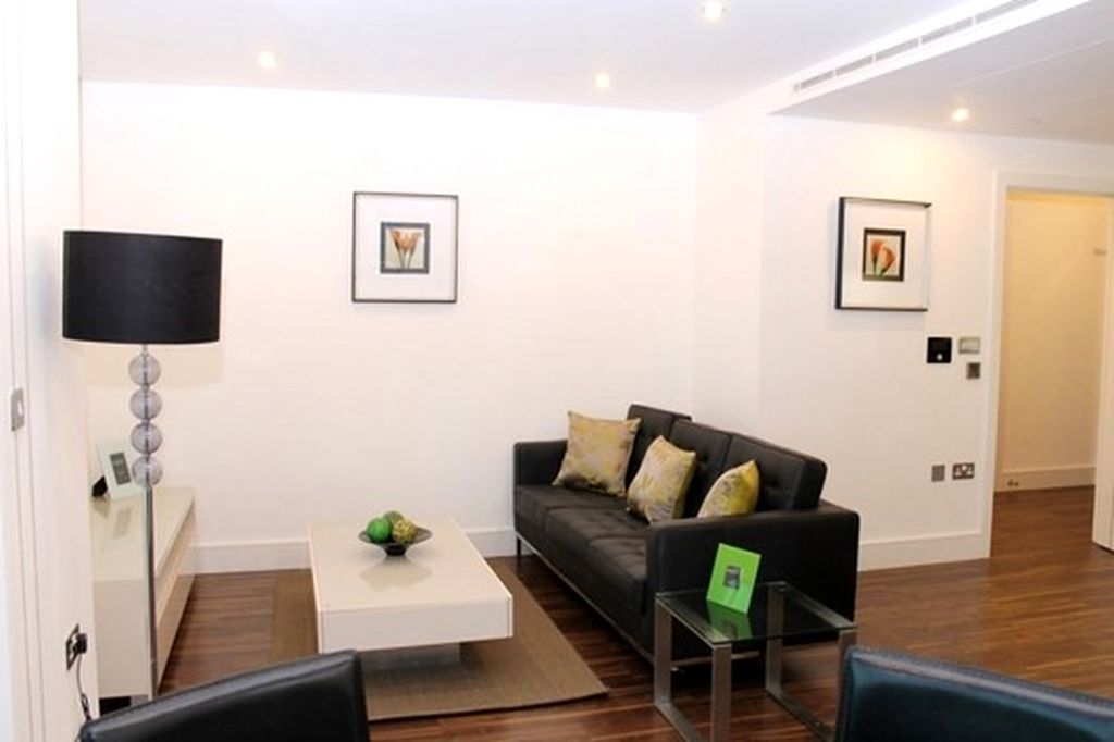 Property photo 1 of 8 Living Area