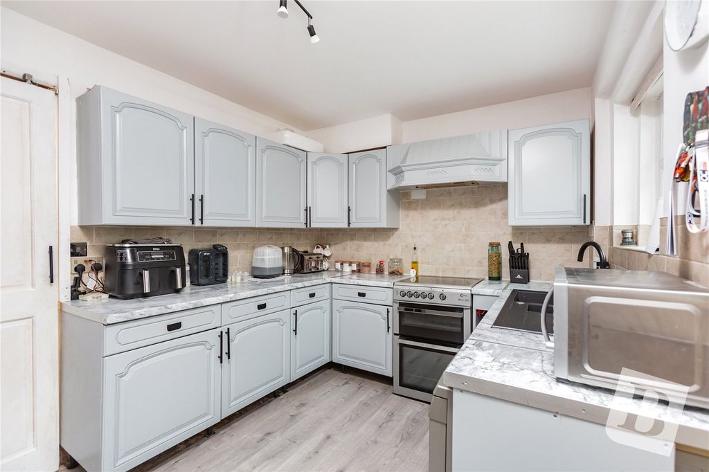 Property photo 2 of 12 Kitchen