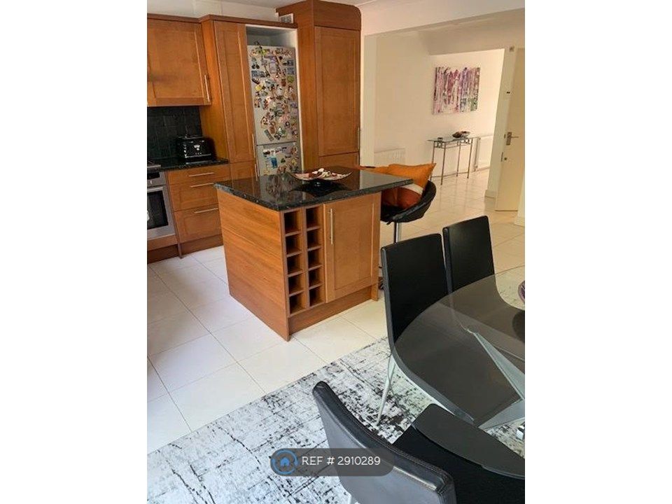 Property photo 2 of 7 Kitchen Island And Workspace