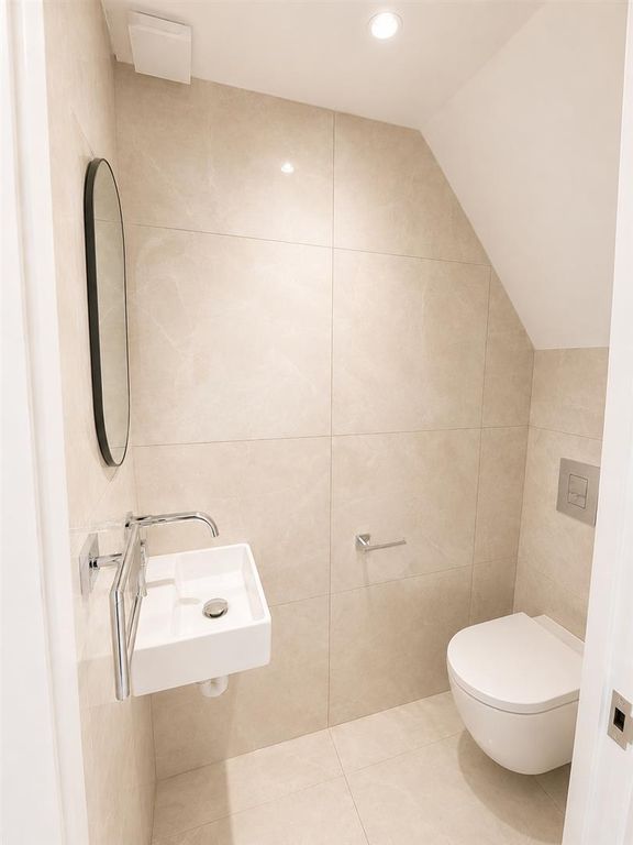 Property photo 3 of 14 Downstairs WC.Png