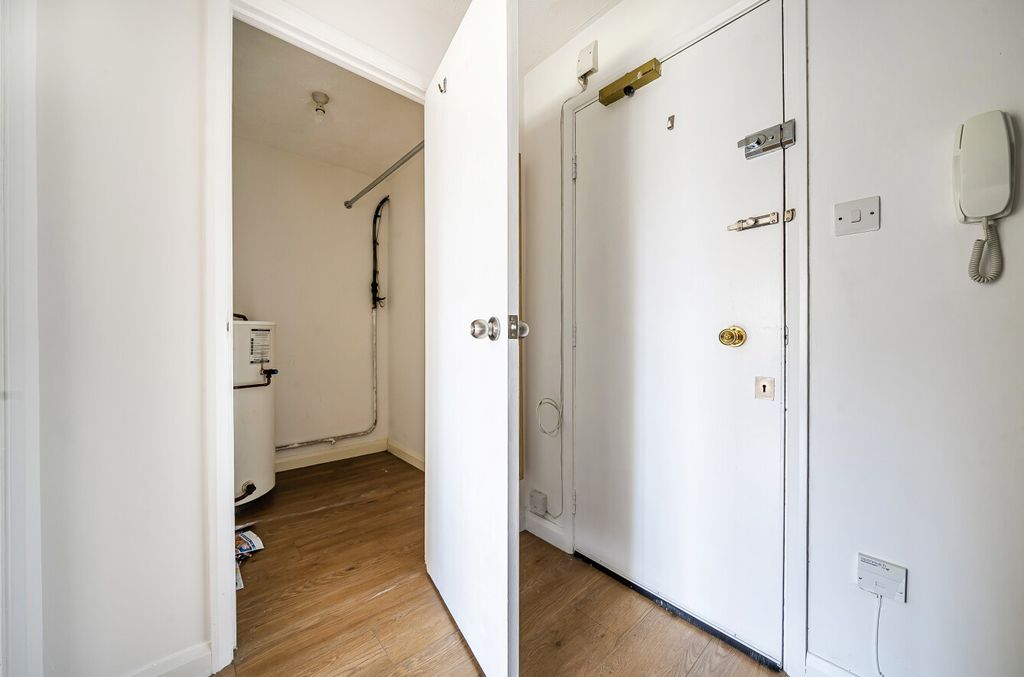 Property photo 2 of 19 Hallway/Storage