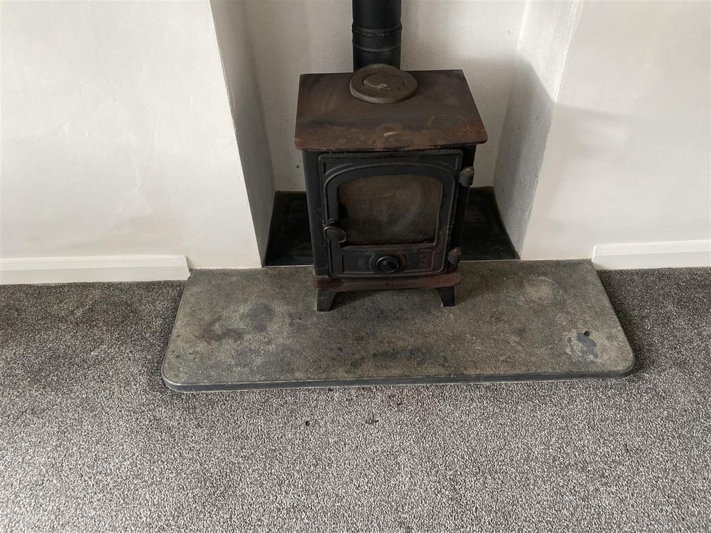 Property photo 3 of 7 Woodburner