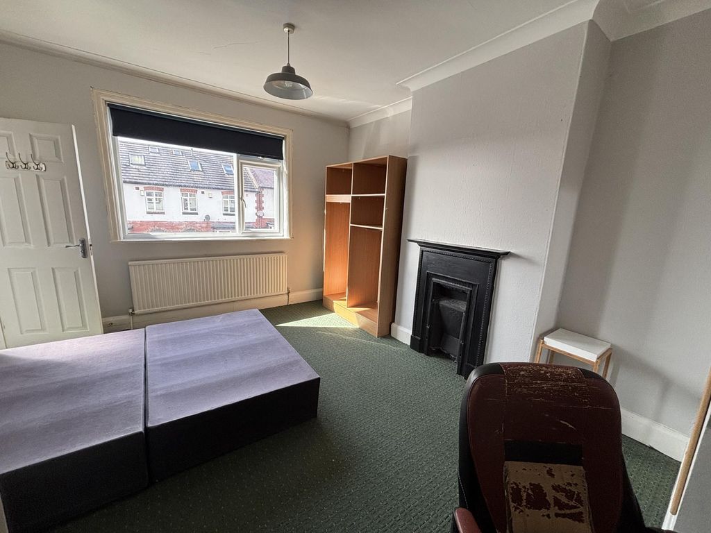 Property photo 3 of 22 A Bright And Welcoming Living Room With A Large Wi...