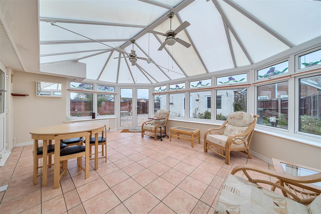 Property photo 2 of 13 Conservatory