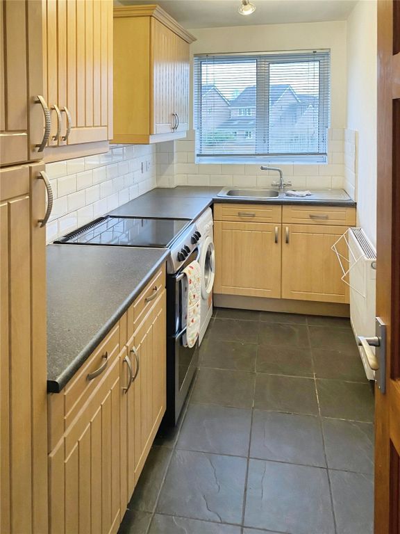 Property photo 3 of 6 Kitchen