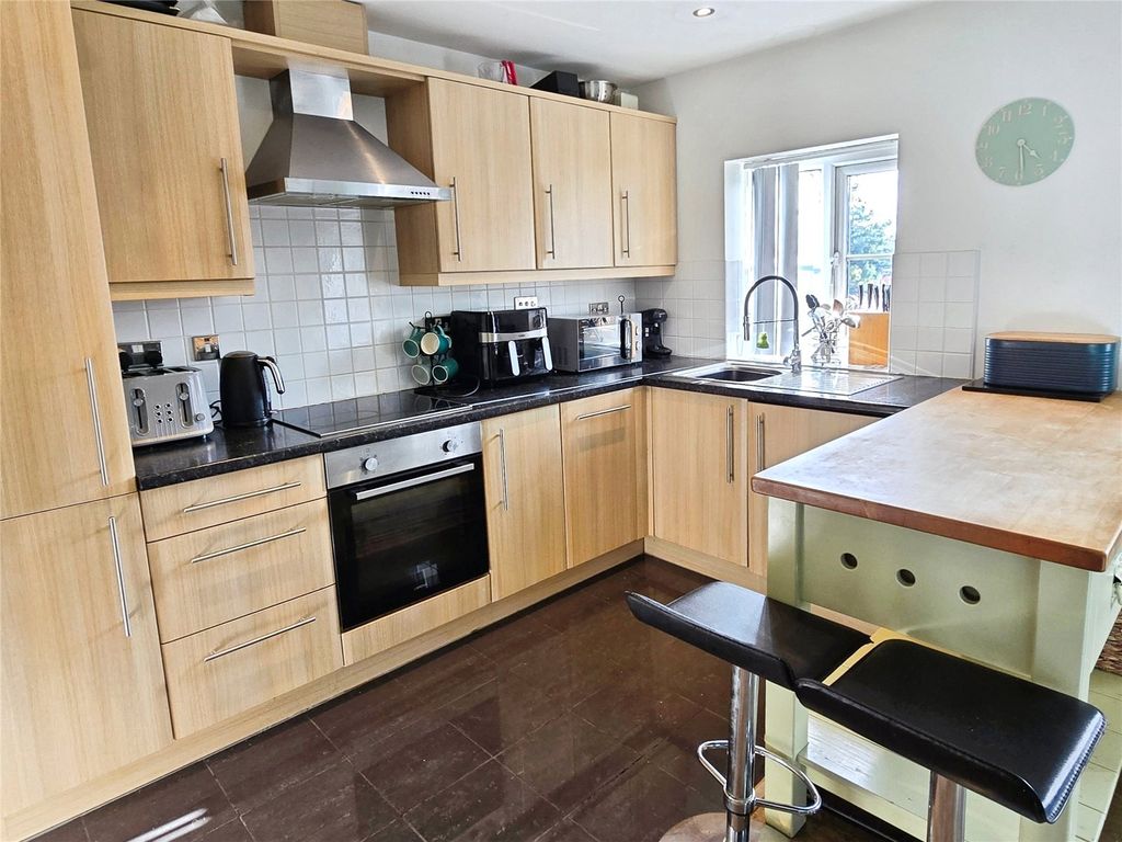 Property photo 2 of 14 Kitchen Area