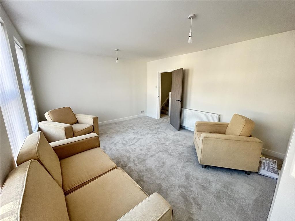 Property photo 3 of 11 Living Room Alt View
