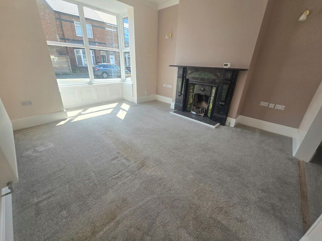 Property photo 2 of 12 Living