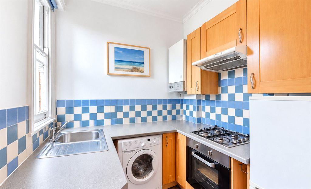 Property photo 3 of 7 Kitchen