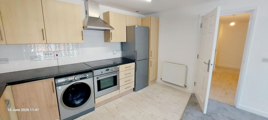 Property photo 3 of 11 Kitchen