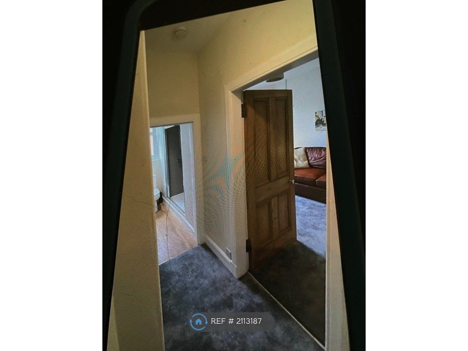 Property photo 3 of 7 Hallway Leading Into Lounge And Bathroom