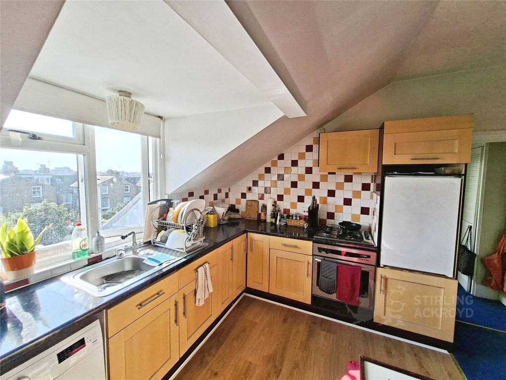 Property photo 2 of 8 Kitchen