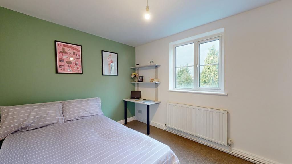 Property photo 3 of 8 A Bright And Inviting Double Bedroom Featuring Sty...