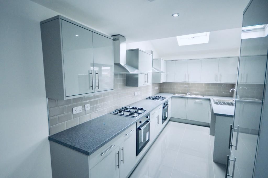 Property photo 3 of 15 A Modern And Spacious Kitchen Equipped With Sleek ...