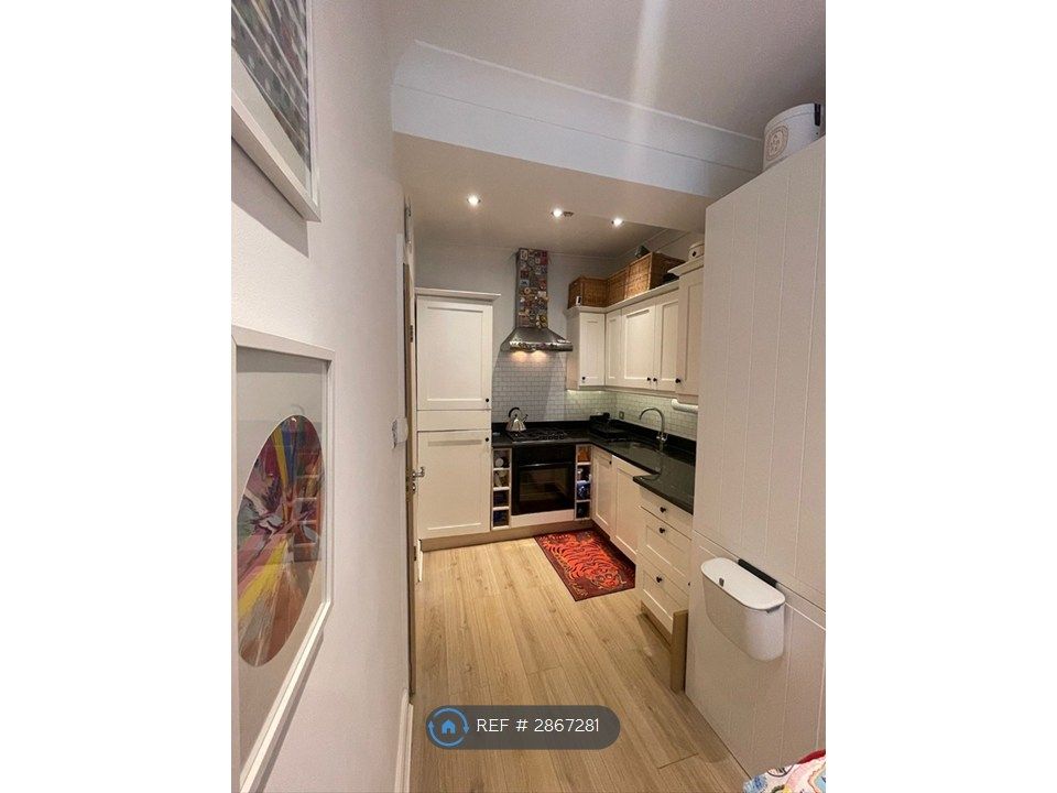 Property photo 3 of 7 Kitchen Area