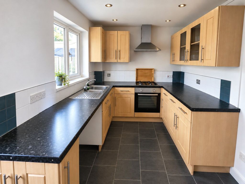 Property photo 3 of 9 Kitchen Area