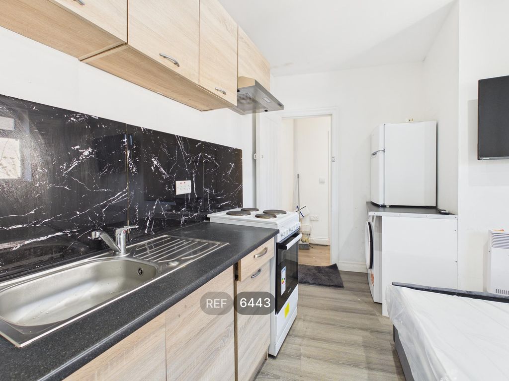 Property photo 2 of 8 Kitchen/Living Area