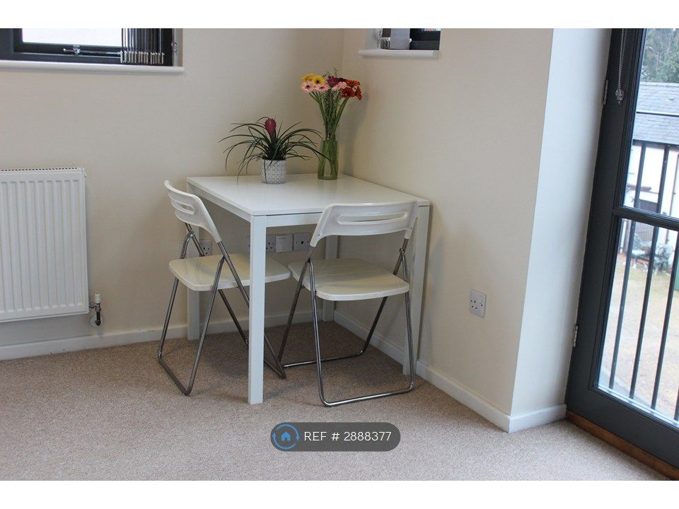 Property photo 3 of 26 Living Area With Table &amp; Chairs