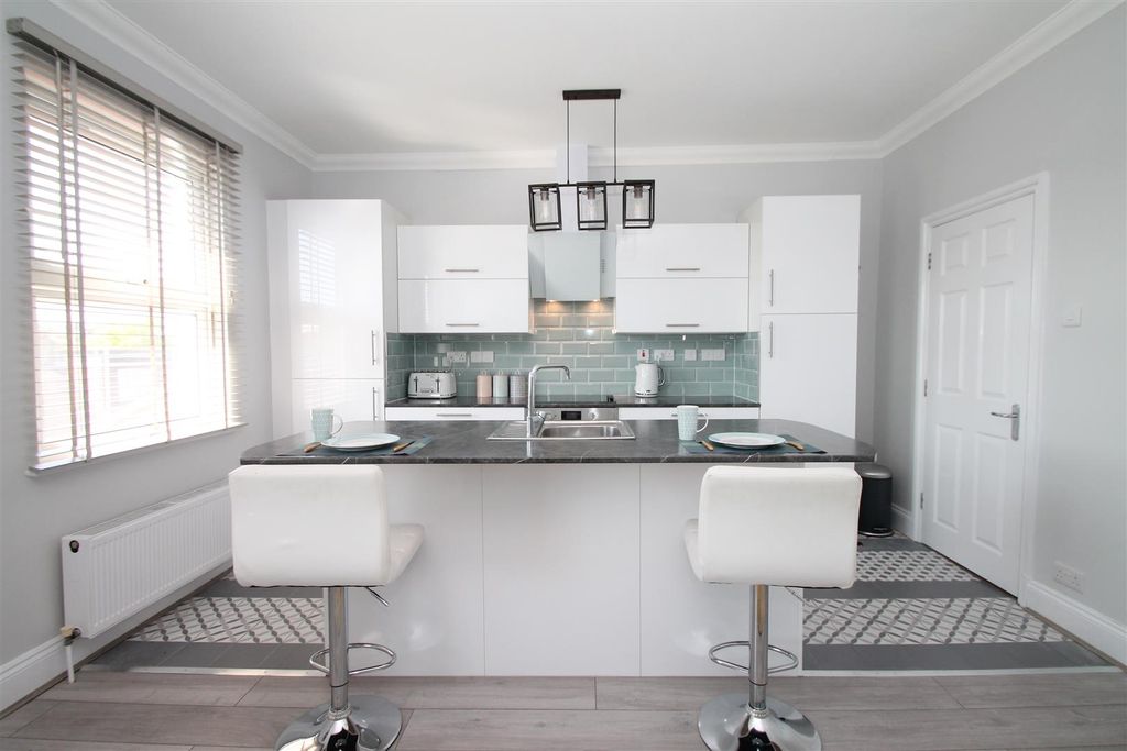 Property photo 2 of 19 Kitchen Area