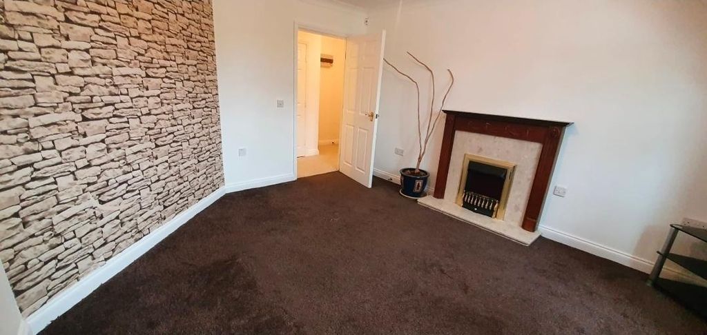 Property photo 1 of 19 Cosy Lounge With Feature Wall And Fireplace...