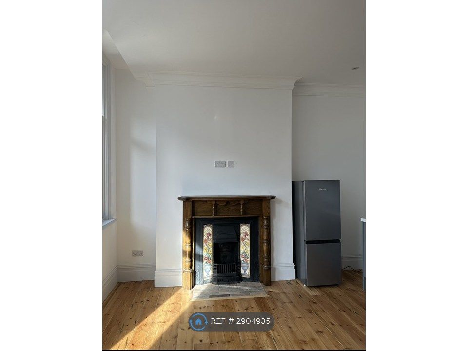 Property photo 3 of 8 Fireplace In Living