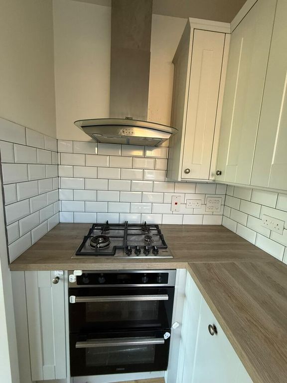 Property photo 3 of 8 Kitchen